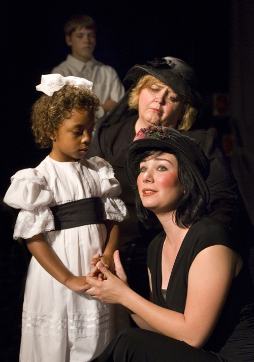 Leilani McAllister as The Girl, Cynthia Meier as The Mother,
Laine Peterson as The Stepdaughter, and Connor Foster as The Boy (background)
