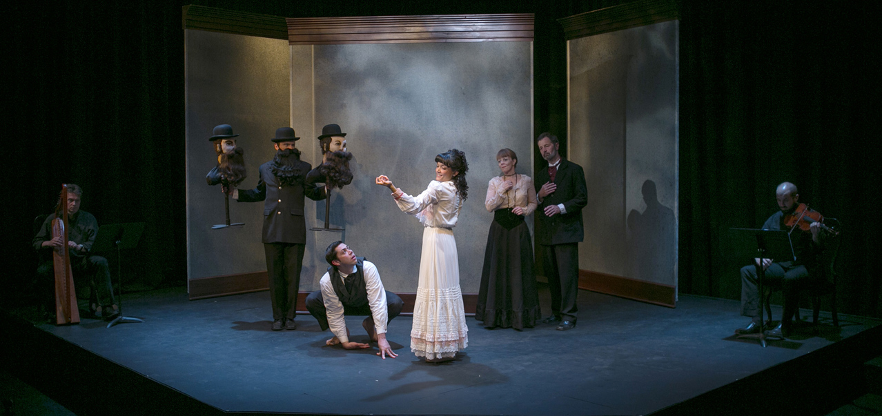 Paul Amiel as Musician, Ryan Parker Knox as the Gentleman, Matt Bowdren as Gregor Samsa, Marissa Garcia as Grete Samsa, Patty Gallagher as Mrs. Samsa, David Greenwood as Mr. Samsa and Eric Schoon as Musician in 'Metamorphosis