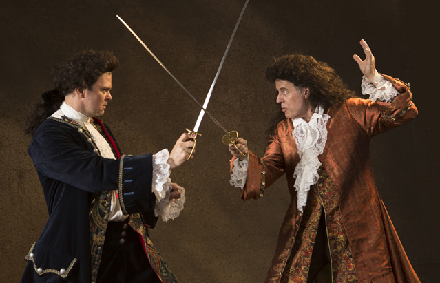 Ryan Parker Knox as Schott and Joseph McGrath as Fasch