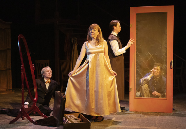 A dress as radiant as the sun. Joseph McGrath, Patty Gallager, Aaron Shand and Ryan Parker Knox.