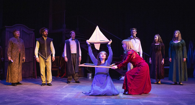 A boat drilled with holes. Joseph McGrath, Hunter Hant, Aaron Shand, Bryn Booth, Patty Gallagher, Ryan Parker Knox, Claire Hancock and Holly Griffith.